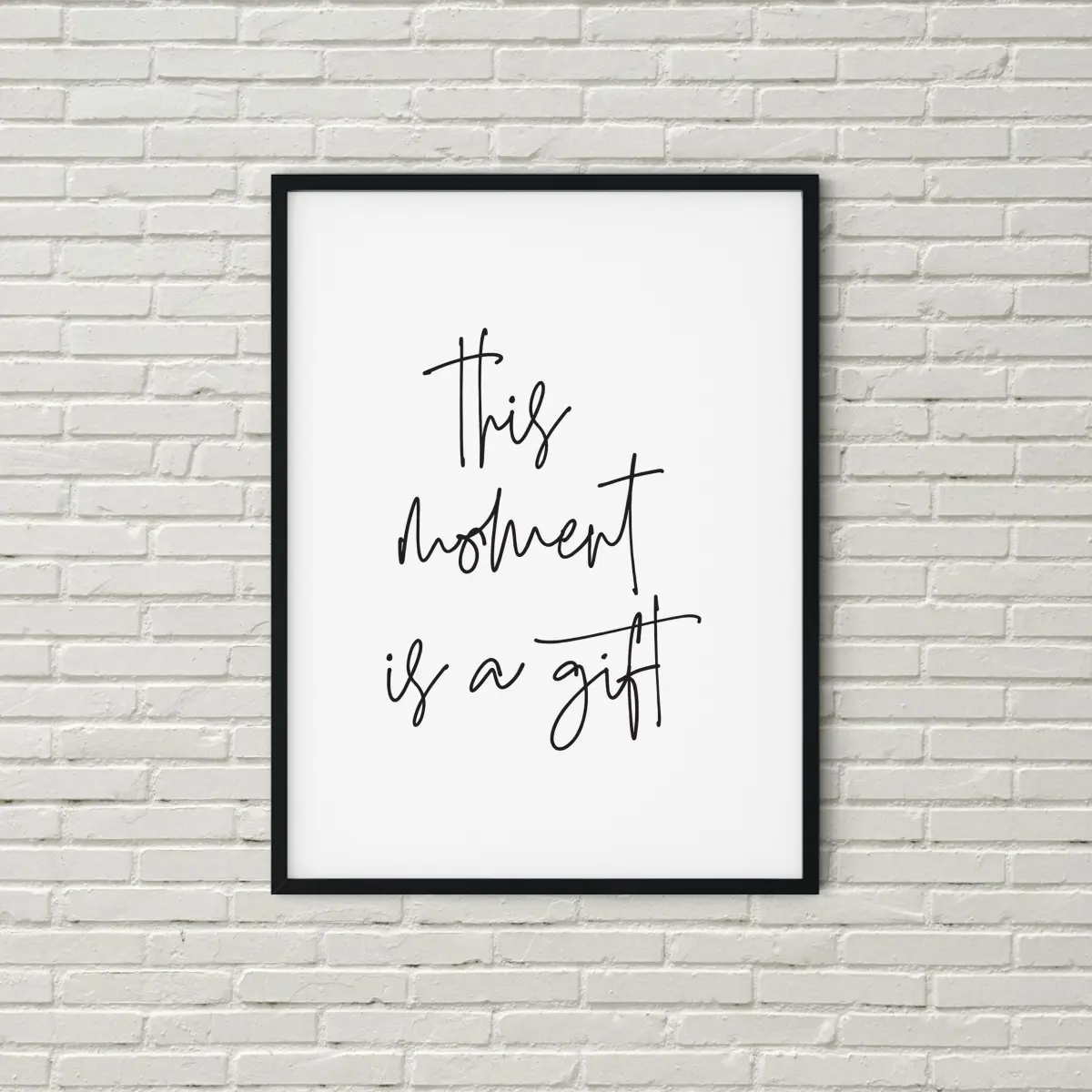 This Moment is a Gift in handwritten script, black on white
